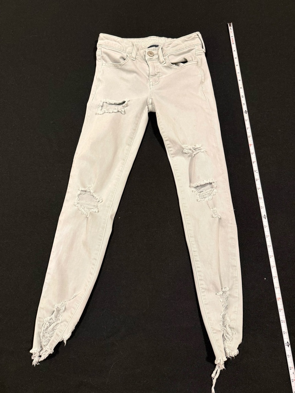 American Eagle Outfitters Light Gray Ripped Skinny Jeans